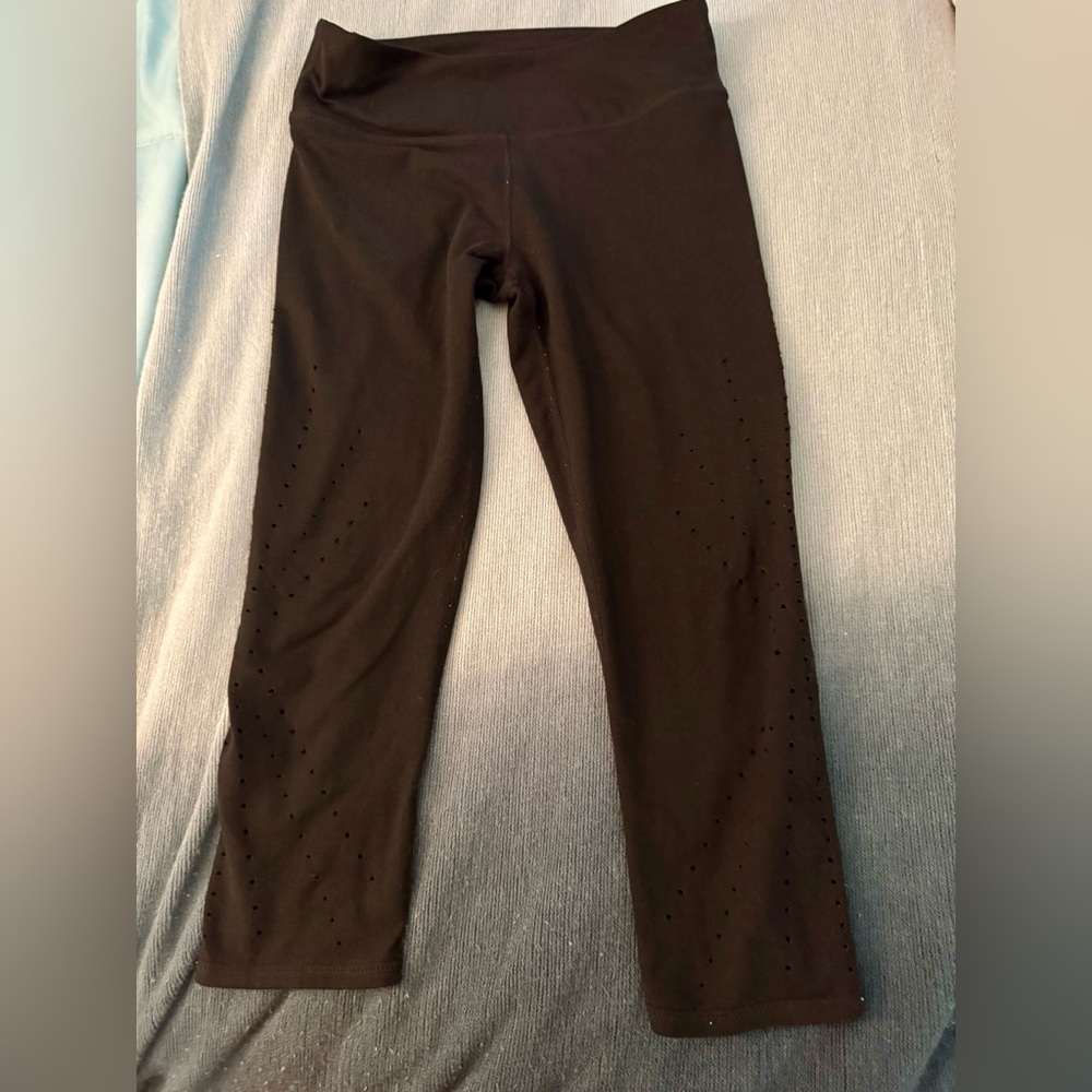 Fabletics Black Capri Leggings. Hi-Waist. Small pointelle detail on legs. Small
